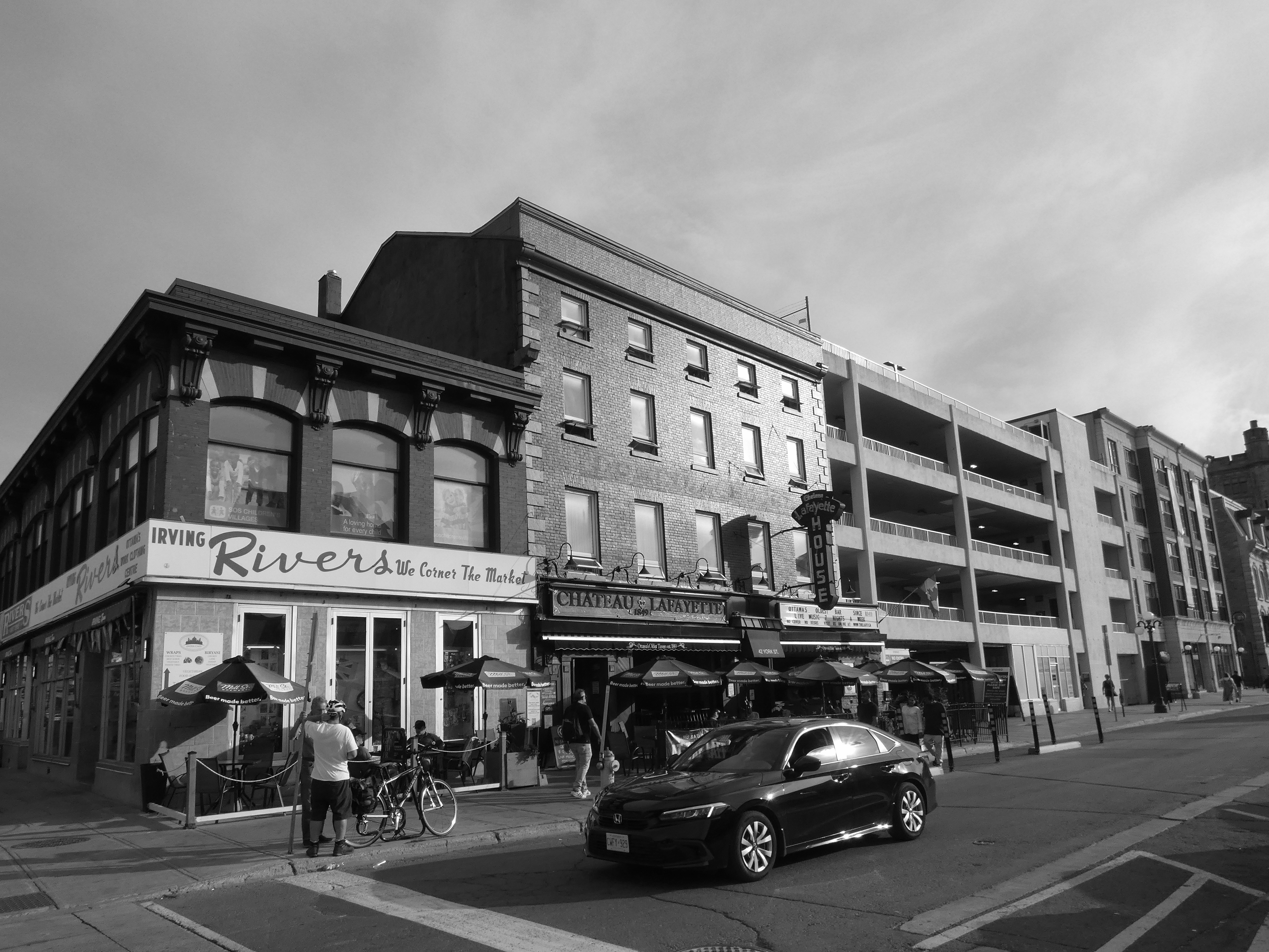 a black and white street view of Irving Rivers store in the Byward Market