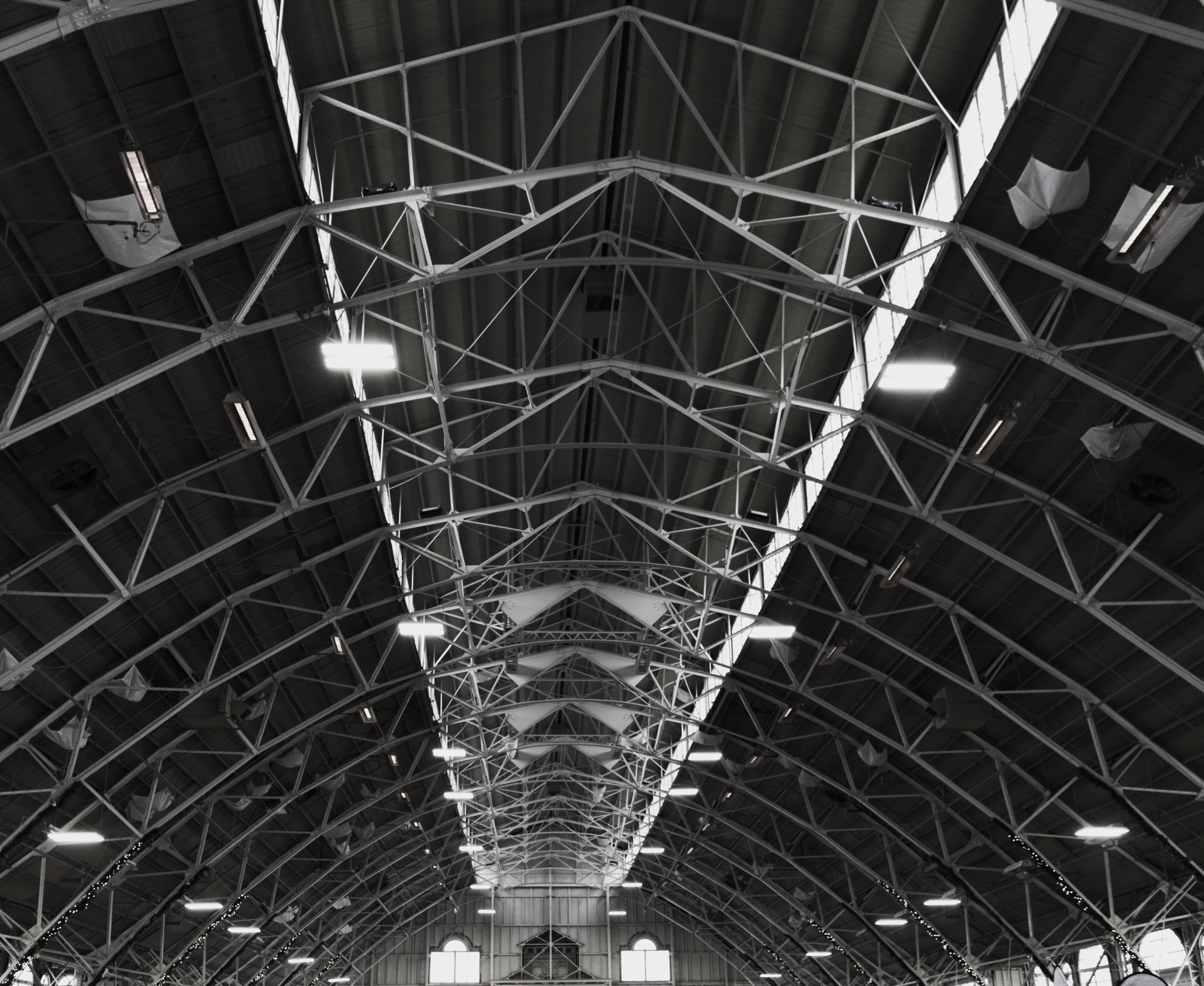 a black and white view of the ceiling struts of the Aberdeen Pavillion