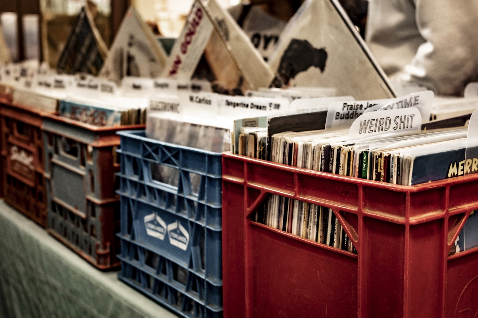 old milk boxes filled with used vinyl records